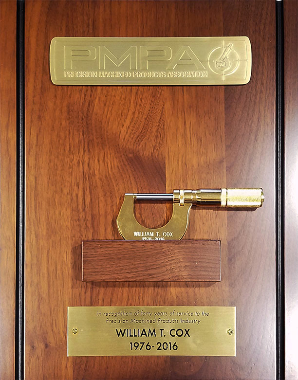 In recognition of forty years of service to the Precision Machined Products Industry, a gold-plated, engraved, working micrometer was awarded to Bill Cox (Cox Manufacturing Company). 